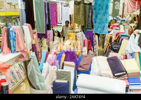 Miami Florida,display case sale,textile,material,cloth,fabric,shopping shopper shoppers shop shops market markets marketplace buying selling,retail st Stock Photo