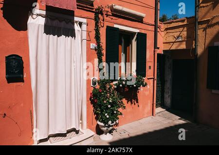 orange house in italian town Murano near Venezia Stock Photo