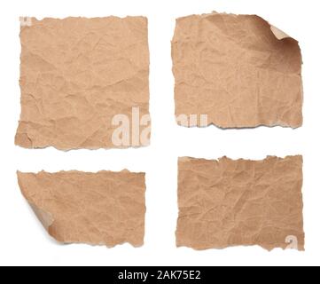 Collection of old brown grunge creased paper sheets isolated on white background Stock Photo