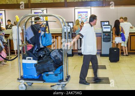 Miami Florida,Hyatt Regency Miami,hotel hotels lodging inn motel motels,bellman,bellhop,luggage,suitcase cart,front desk check in reception reservatio Stock Photo