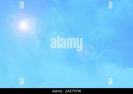 Pale blue gradient sky with sun glare, soft blue color sky background Stock Photo