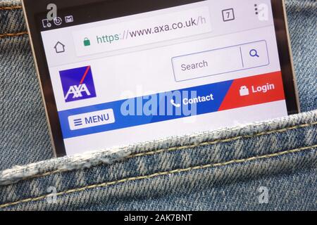AXA website displayed on smartphone hidden in jeans pocket Stock Photo