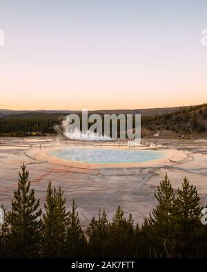 Grand Prismatic Spring at sunset in Yellowstone National Park, Wyoming, USA Stock Photo