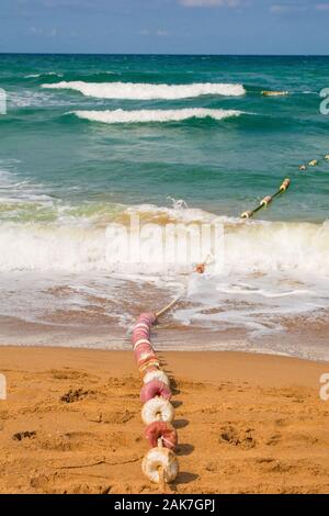 A line of buoys on Agva beach on the Black Sea coast in the Sile district of Istanbul province, Turkey. Stock Photo
