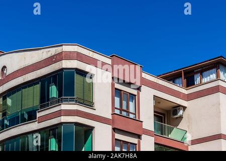 a well angled corner shoot from a modern building with red and white colors. photo has taken at izmir/turkey. Stock Photo