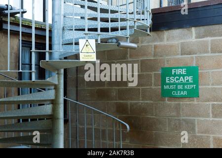 Fire escape stairs outside building Stock Photo
