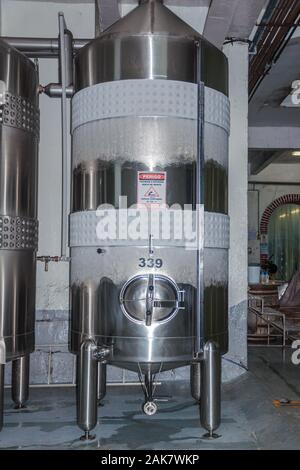 Stainless steel storage tanks for wine production at Aurora Winery in Bento Goncalves. A wine producing country city in southern Brazil. Stock Photo
