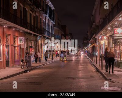 New Orleans, LA, USA. December 2019. Tourists and Historic Buildings on Royal street. Nightlife Stock Photo