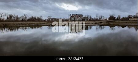 Building a new home by the lake Stock Photo