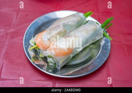 Vietnamese street food- fresh shrimp rolls with chives, Goi Cuon Stock Photo