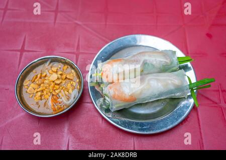 Vietnamese classic fresh spring rolls served with peanut sauce Stock Photo
