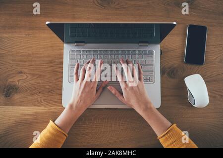 Close up of business woman hand working on office desk Stock Photo