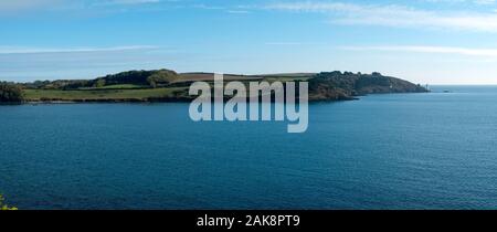 The view to St Anthony Head and the lighthouse from St Mawes, Cornwall, UK Stock Photo