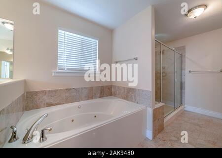 Modern luxury fitted bathroom interior in home Stock Photo