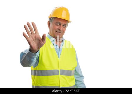 Trustworthy old builder man smiling as waving hand isolated on white studio background Stock Photo