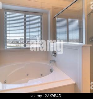 Square Bathroom interior with spa bath or jacuzzi Stock Photo