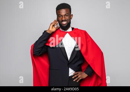 Young african businessman talking on the phone on white background Stock Photo