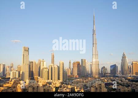 Dubai city skyline with Burj Khalifa skyscraper in a sunny day, blue sky