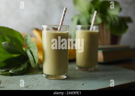 Healthy green smoothie and ingredients. Stock Photo