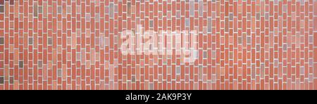 Panorama of a wall made of vertical bricks Stock Photo