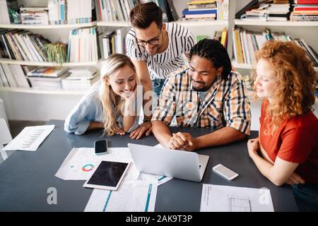 Group of successful business people designers architects in office Stock Photo