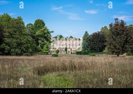 Anglesey Abbey, view of the grounds and south face of Anglesey Abbey, a 17th century country house in Lode village, Cambridgeshire, England, UK. Stock Photo