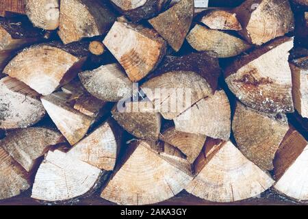 Background of wooden textured firewoods Stock Photo