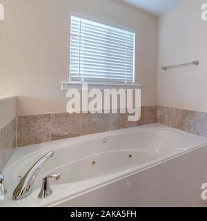 Square Modern luxury fitted bathroom interior in home Stock Photo