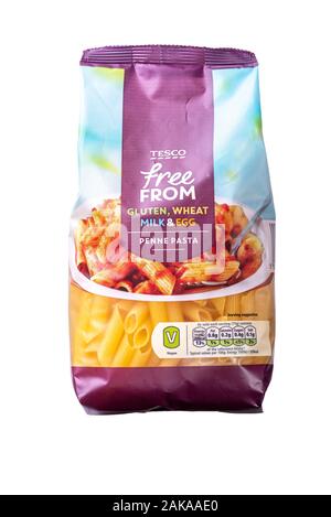 Gluten, milk, and egg free, penne pasta tubes. B free pasta pack isolated on white. Stock Photo