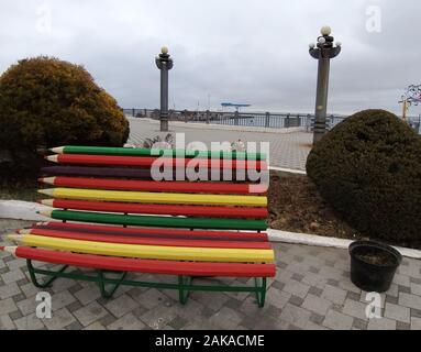 bench of colored pencils on the waterfront in the city of Anapa Stock Photo