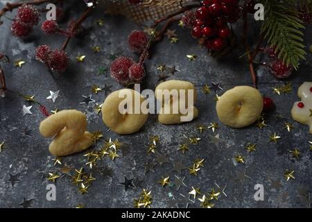 Christmas Baking Background With Assorted Christmas Cookies, Spices, Cookie  Molds And Wooden Cutting Board. Top View. Stock Photo, Picture and Royalty  Free Image. Image 87667394.