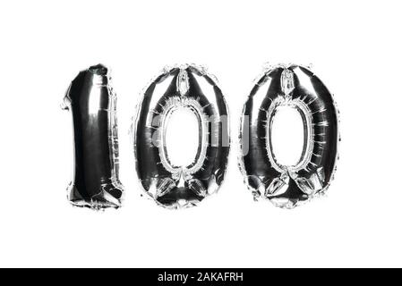 Balloon Bunting for celebration Happy 100th Anniversary made from Silver Number Balloons. Holiday Party Decoration or postcard concept with top view, isolated image Stock Photo