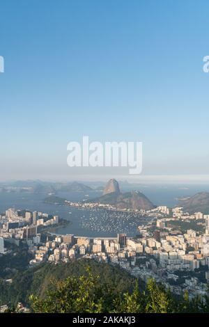 View over Sugarloaf Mountain, Botafogo and Guanabara Bay from Mirante Dona Marta in Rio de Janeiro. Stock Photo