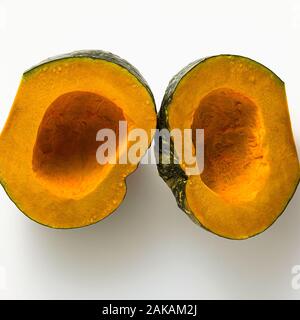 half-cut pumpkin isolated on white. healthy product. source of vitamins Stock Photo