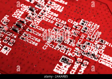 Macro shot of Circuit board with resistors microchips and electronic components. Computer hardware technology. Integrated communication processor. Inf Stock Photo