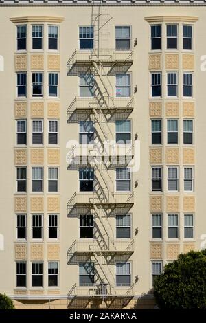 Victorian high-rise building with fire escape on Steiner Street at Alamo Square, San Francisco, California, USA Stock Photo