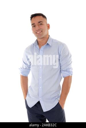 A handsome east Indian man standing in dress pants and a blue shirt relaxed in the studio, smiling, isolated for white background Stock Photo
