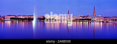 Inner Alster Lake and old town of Hamburg at night, Germany