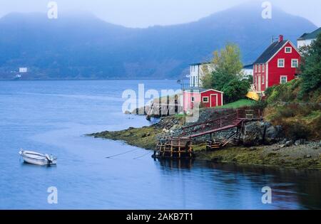 Red houses in coastal town, Burin Peninsula, Newfoundland, Canada Stock Photo