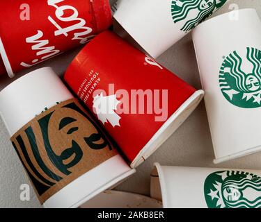 Tim Horton and Starbucks disposable coffee cups. Stock Photo