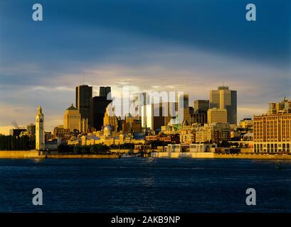 Montreal skyline on waterfront at sunset, Quebec, Canada Stock Photo