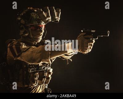 Counter terrorist squad fighter soldier aiming pistol Stock Photo