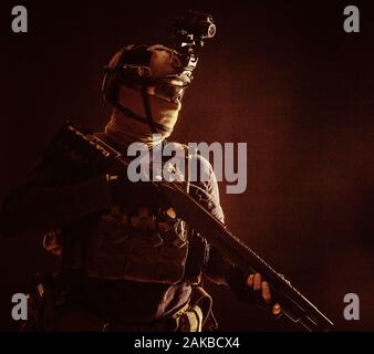 Army elite troops soldier low key studio portrait Stock Photo
