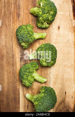 Healthy food. Vibrant broccoli pieces are arranged to showcase their ...