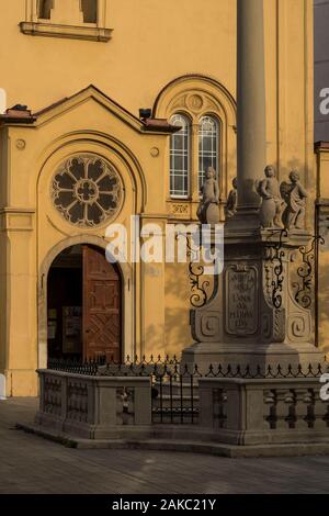 Slovakia, Bratislava, church of the Capuchins consecrated in 1717 and dedicated to Saint-Etienne of Hungary with on its forecourt a column erected in 1723 recalling the epidemic of plague Stock Photo