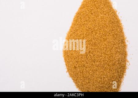 close up of brown sugar on the white background Stock Photo