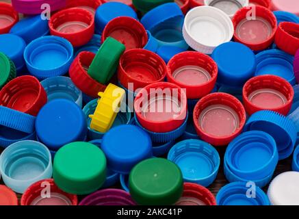 close-up of a large number of colorful, plastic bottle caps Stock Photo