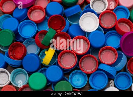 close-up of a large number of colorful, plastic bottle caps Stock Photo