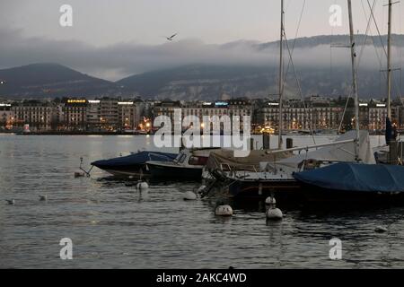 Switzerland, Geneva canton, Geneva, Quai du Mont Blanc, shores of Lake Geneva, twilight in december Stock Photo