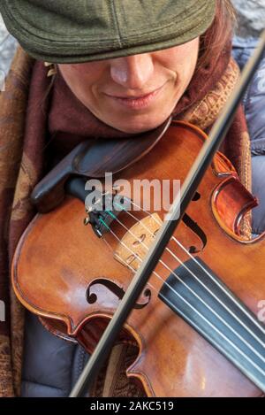 Ireland, County Galway, Galway, woman playing the violin Stock Photo